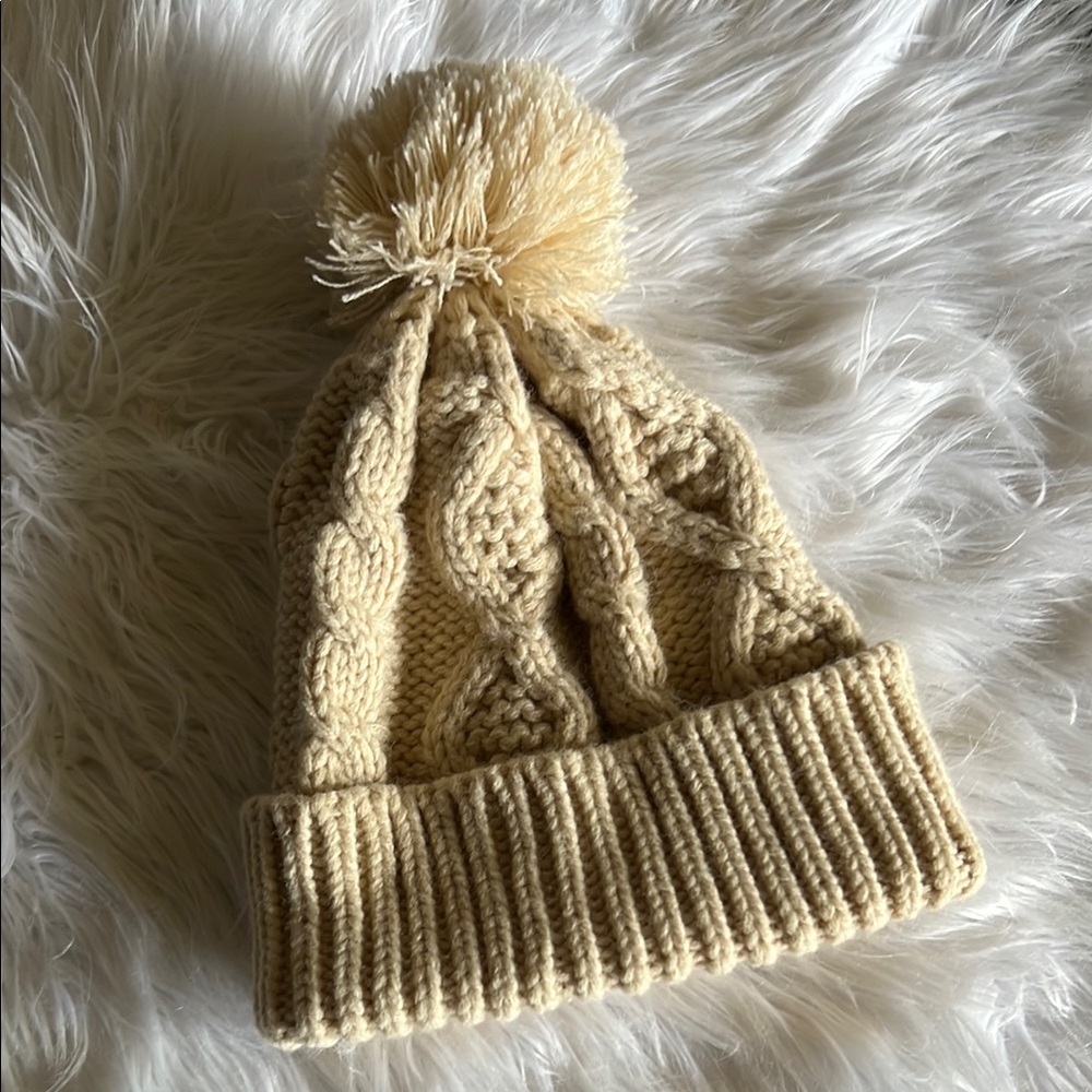 Cream pompom knit beanie